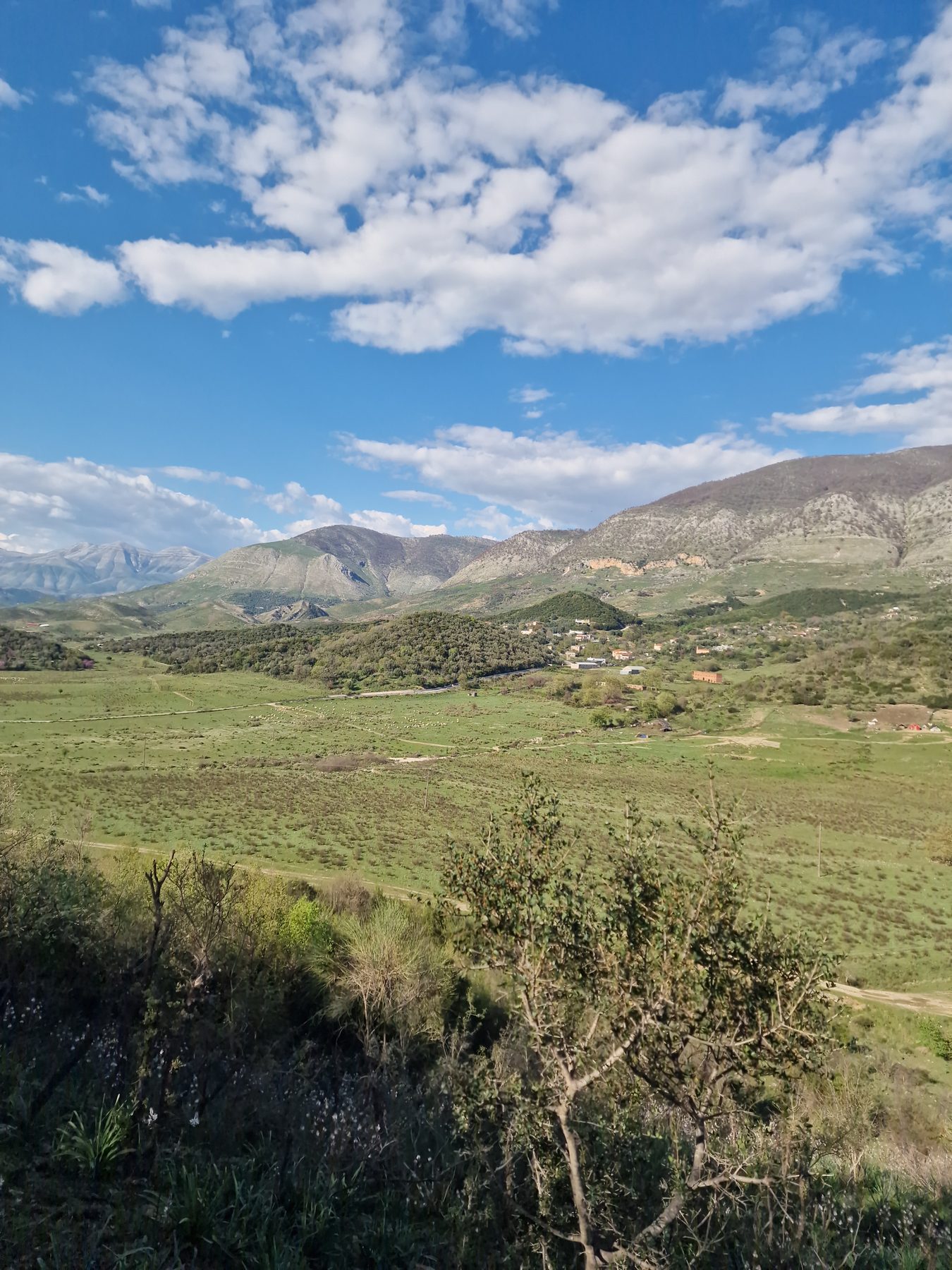 Rolling green hills toward Navaricë