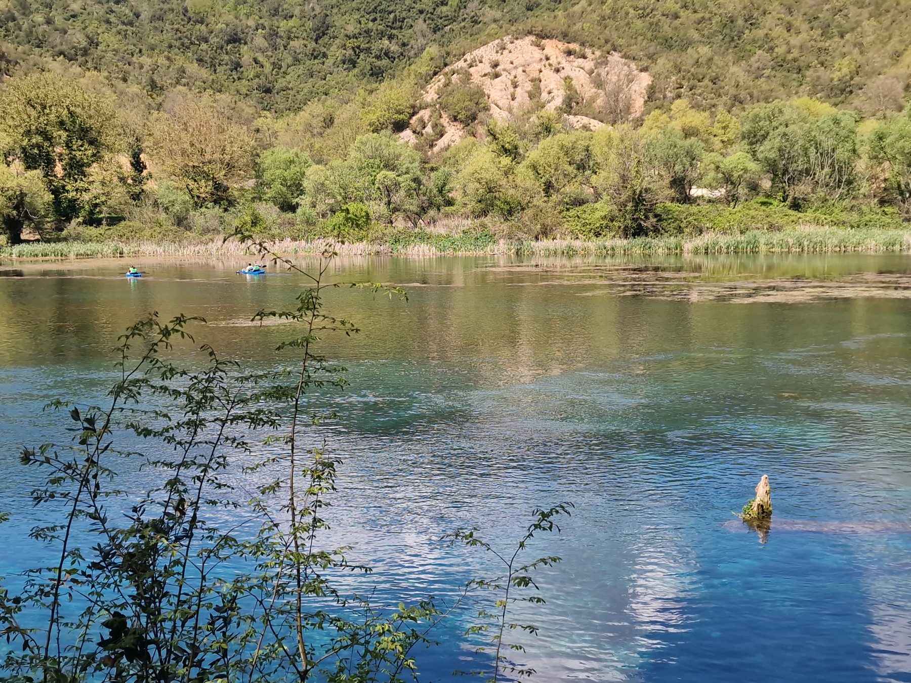 The clear river below the Blue Eye